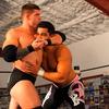 Wrenching in the headlock.